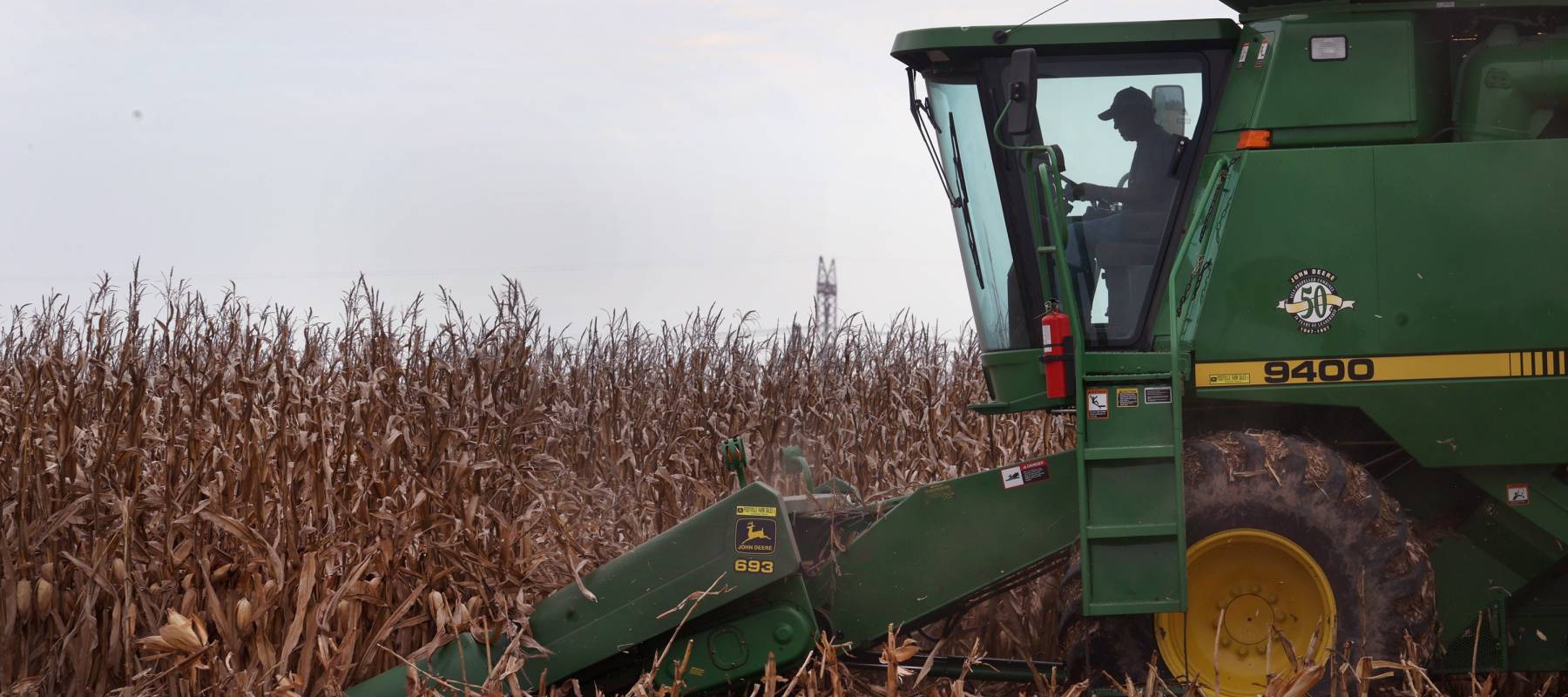 A farmer harvests corn in Princeton, indiana, Oct. 11, 2021.