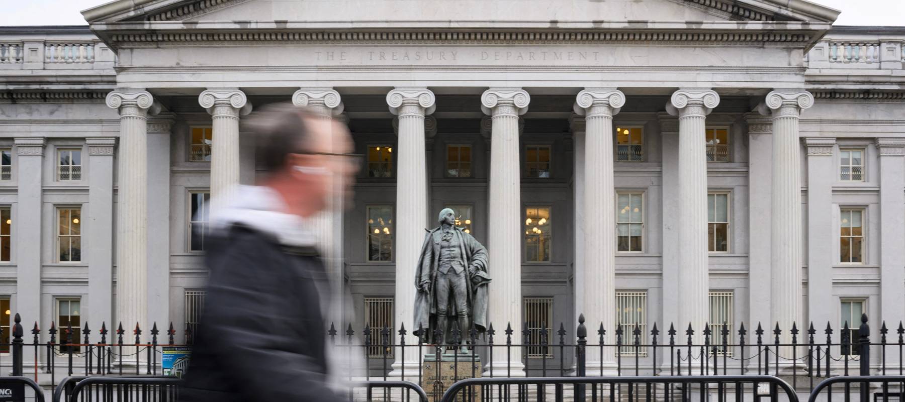A man walks past the Department of the Treasury in Washington, D.C., Feb. 6, 2025.