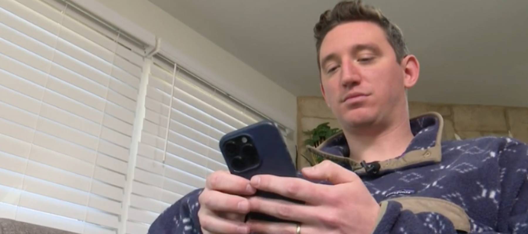 A man on his cellphone.