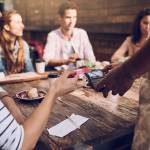 Customers paying their bill at a restaurant