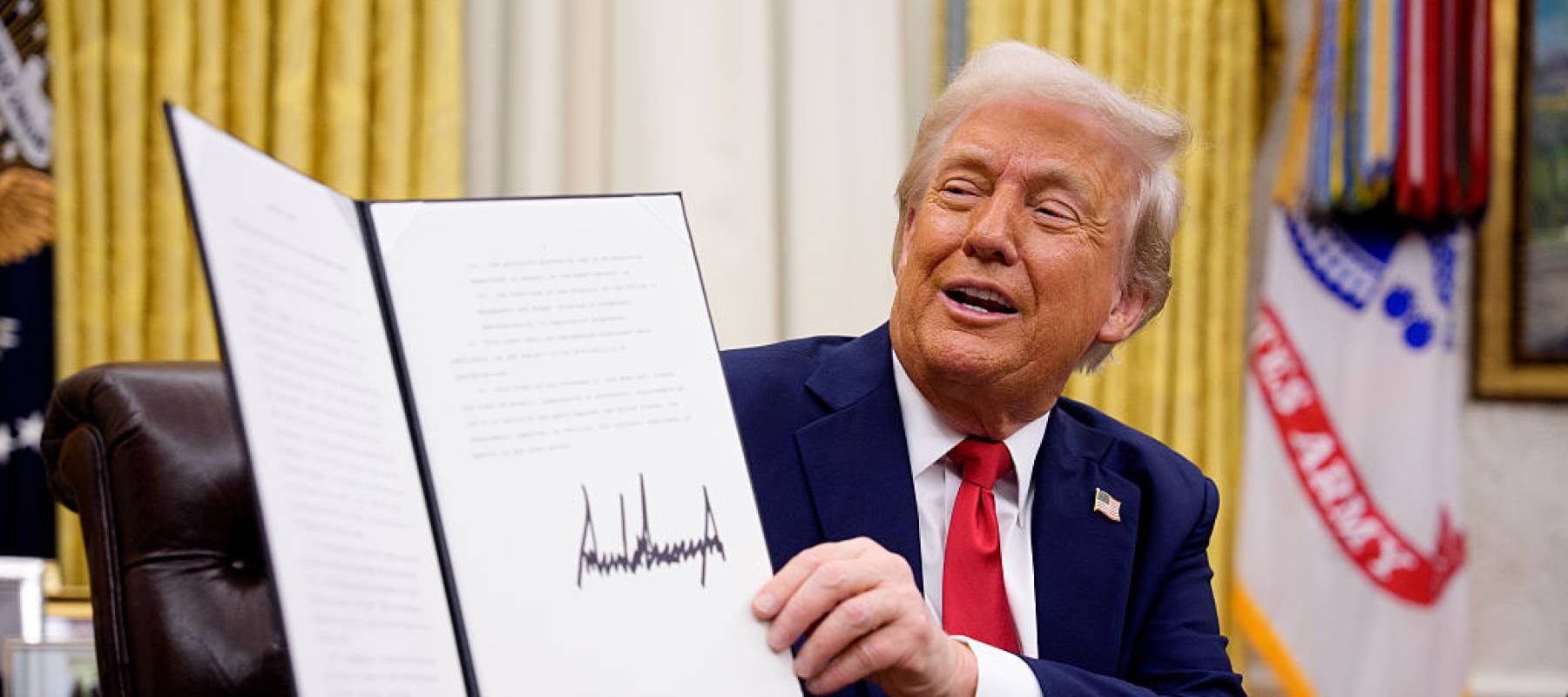 U.S. President Donald Trump signs an executive order