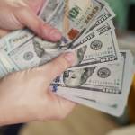 Person holding cash