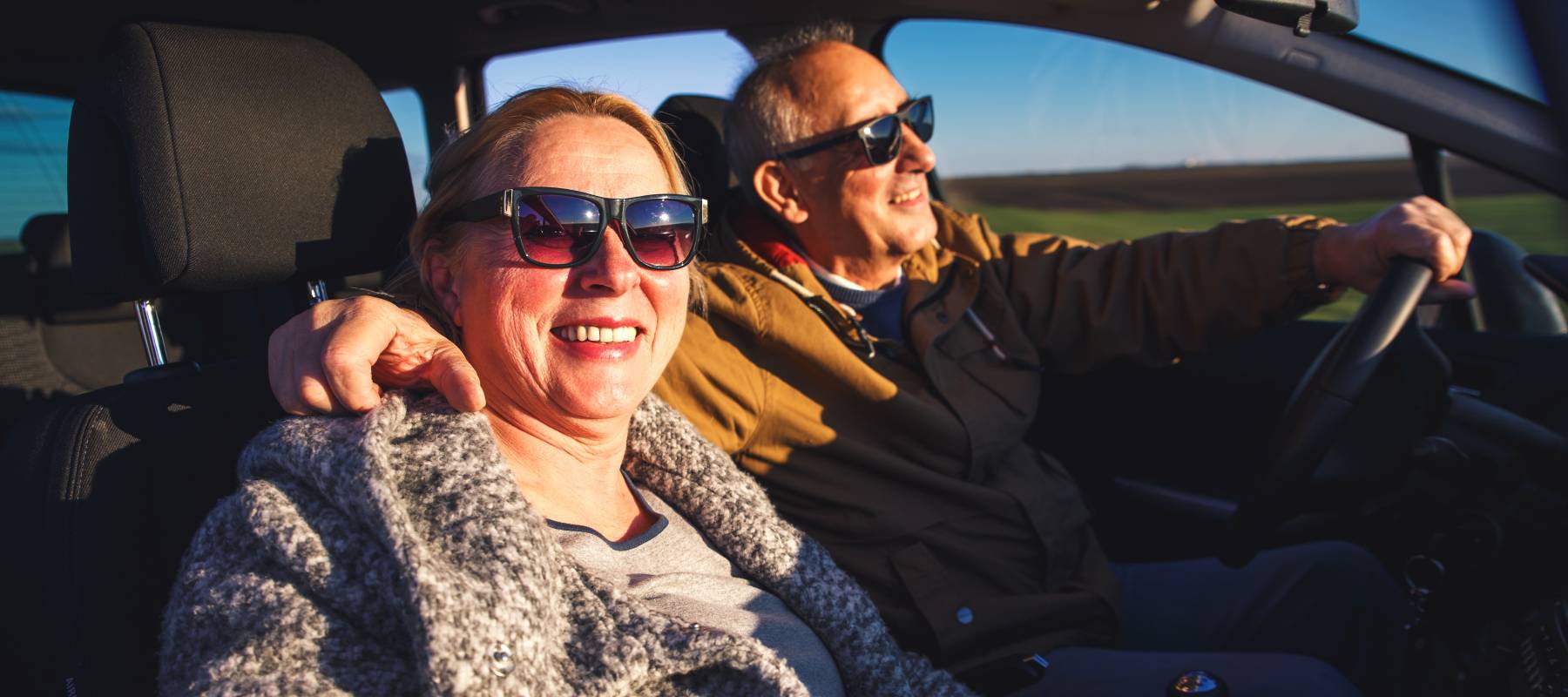 Older couple driving