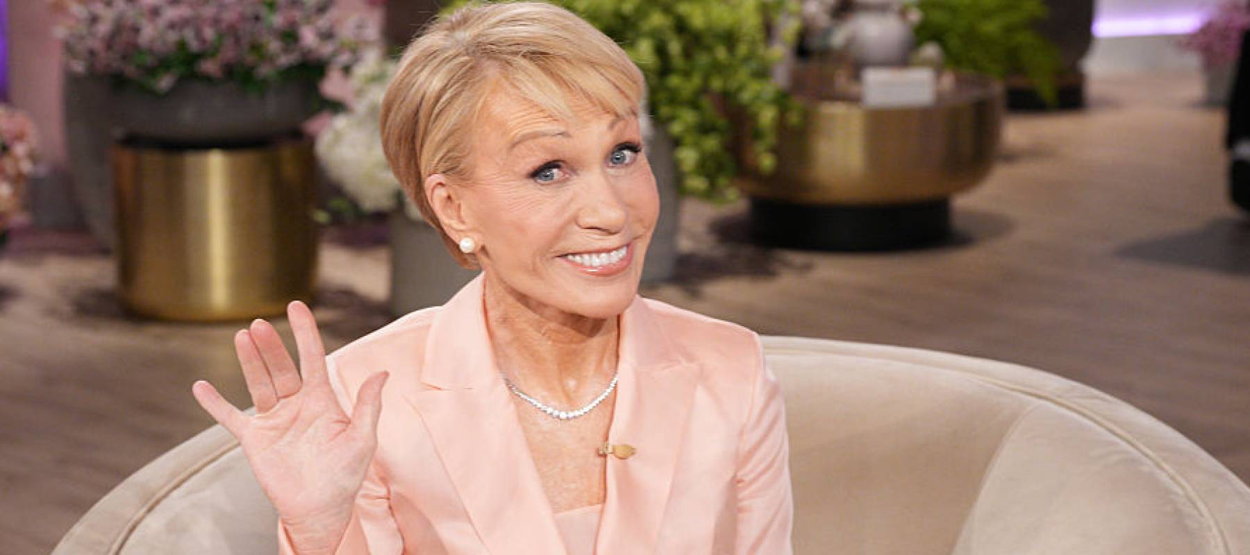 Barbara Corcoran waves at a camera.