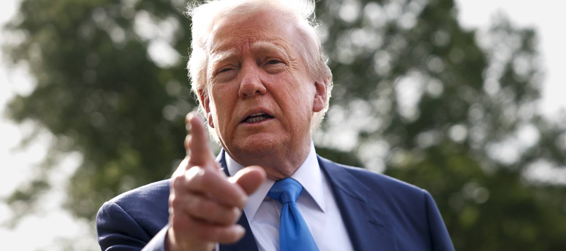 President Donald Trump speaks to the media as he departs the White House in Washington, D.C., April 25, 2025.