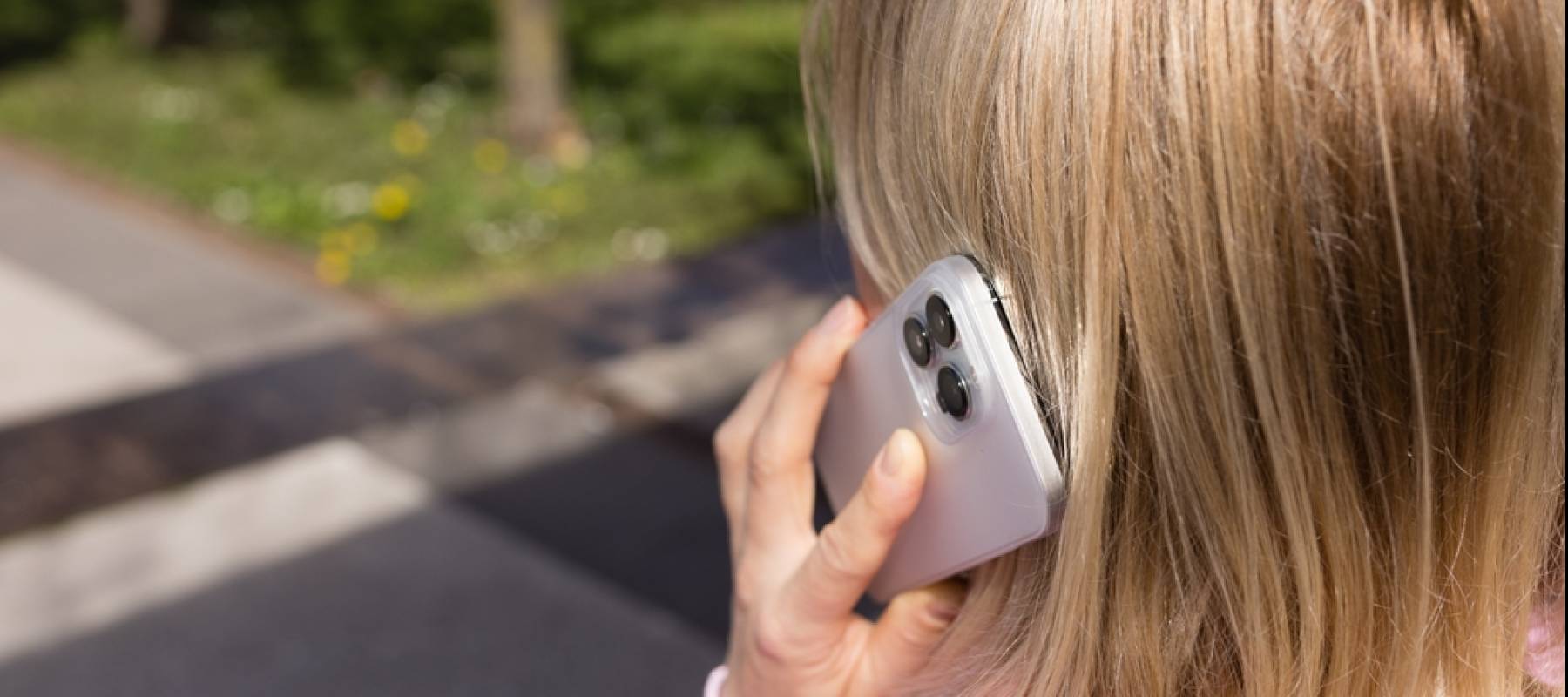 Woman over-the-shoulder on phone
