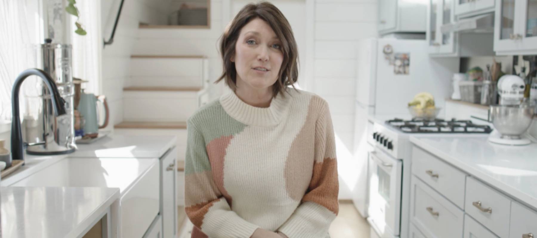 Woman in her tiny luxury home