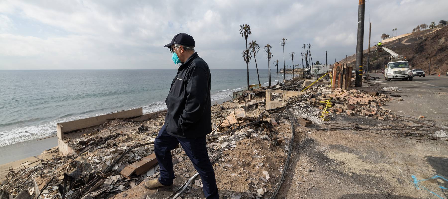 Neil Lerner visits the burned site of the oceanfront house on Pacific Coast Highway.