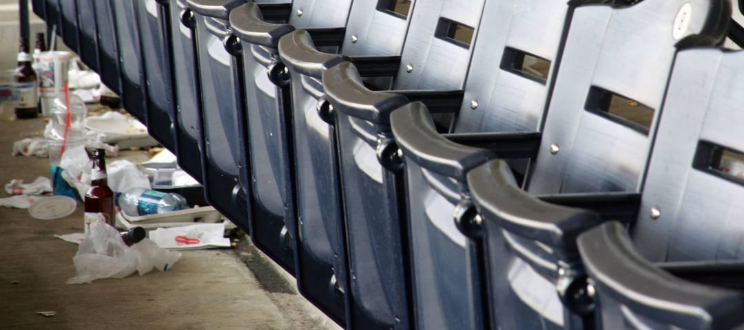 ballpark seating with trash