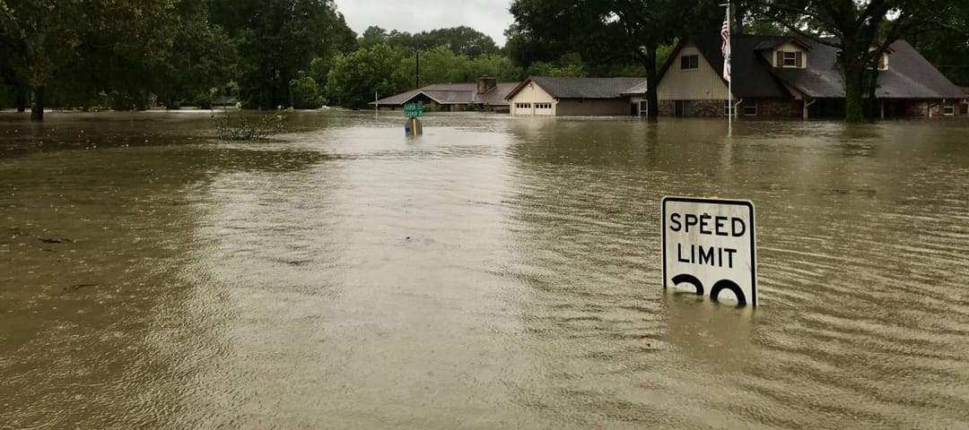 Hurricane Harvey 2017, flooding in Spring Texas, a couple miles north of Houston. Speed limit sign almost completely submerged.