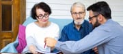 Retirement adviser planning with retired senior couple