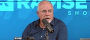 Dave Ramsey makes a shocked face on set of his podcast.