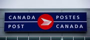 The Canada Post logo is seen on the outside the company's Pacific Processing Centre, in Richmond, B.C., on June 1, 2017. 
