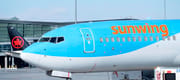 A Sunwing aircraft is parked at Montreal Trudeau airport in Montreal on Wednesday, March 2, 2022.WestJet says it aims to wind down Sunwing Airlines and integrate the low-cost carrier into its