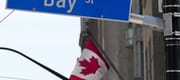 The Bay Street Financial District is shown with the Canadian flag in Toronto on Friday, August 5, 2022.&nbsp;Brookfield Asset Management Ltd. says it has raised US$12 billion for its latest g