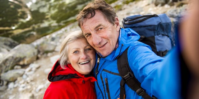 Retired couple hiking