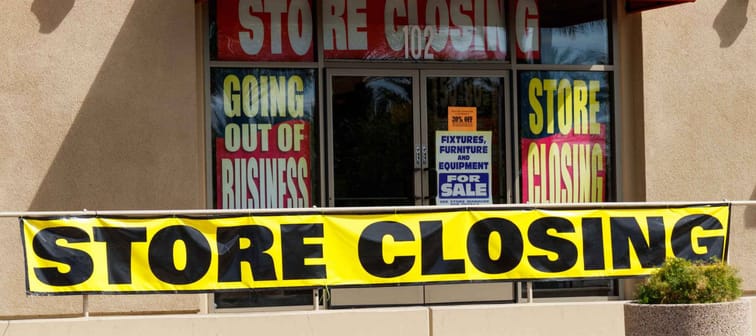 Store Closing and Going out of Business signs displayed at a soon to be closed store