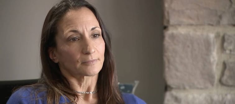 Woman talking about her experience as a victim of a dealership cloning scam.