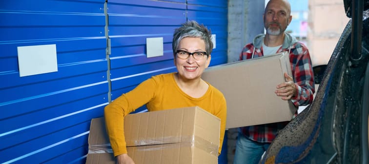 Woman unpacking boxes.