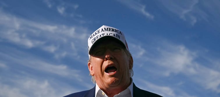 President Donald Trump speaks to journalists before boarding Air Force One in Morristown, New Jersey, May 25, 2025.