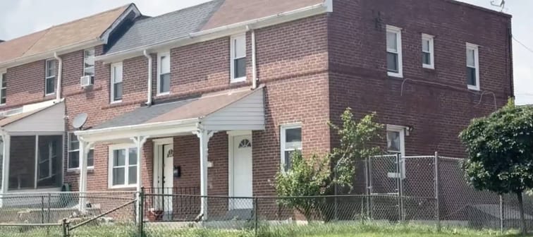 Exterior shot of home where alleged squatters have moved in.