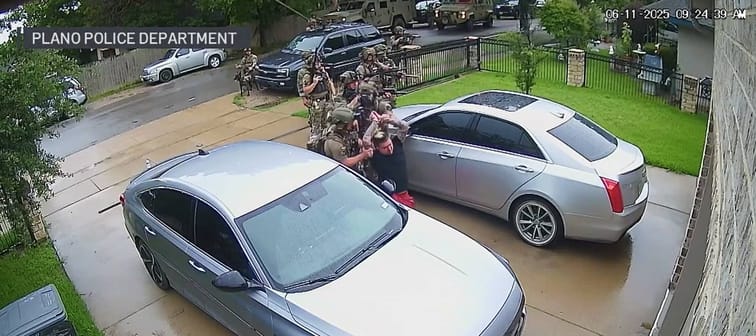 Home surveillance footage obtained by NBC DFW shows local and federal authorities execute a search warrant at a home in Dallas.