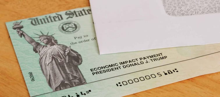 ATLANTA, GEORGIA - May 7, 2020 : United States Treasury Economic Impact check including President Donald J. Trump printed name. Stimulus check for Coronavirus COVID-19 pandemic relief.