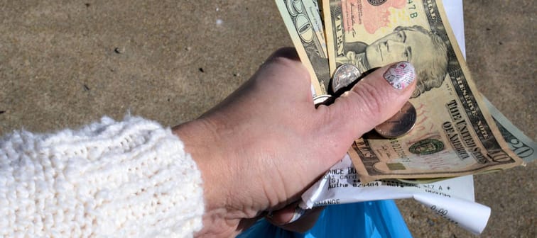 Woman holding cash