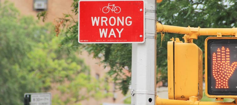 A wrong way street sign.