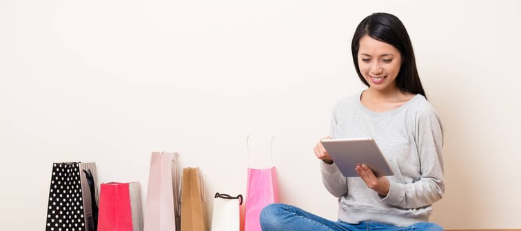 Woman shopping on iPad