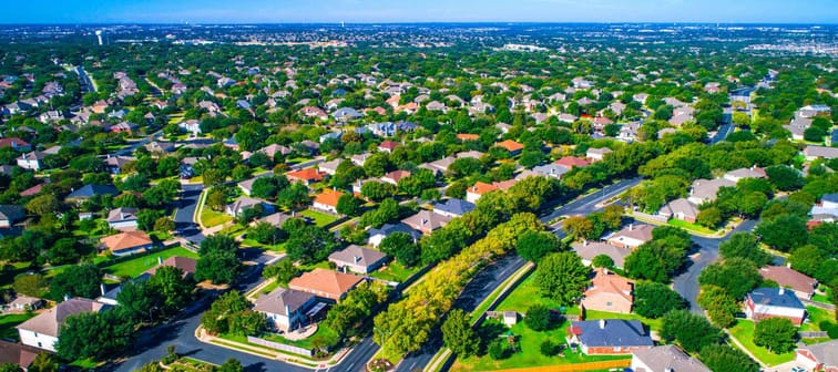 Green escape luxury living Round Rock , Texas , USA Suburb growing outside of Austin high aerial drone view green end of summer colorful morning Millions of Homes vast Neighborhood Suburbia
