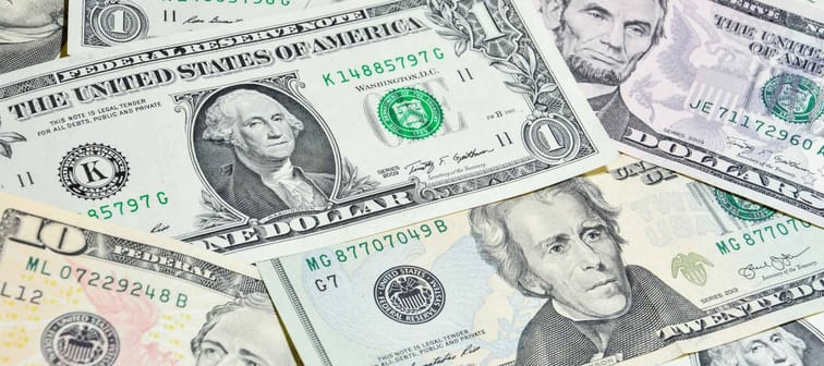 American Dollar bills, closeup of Washington on one dollar bill