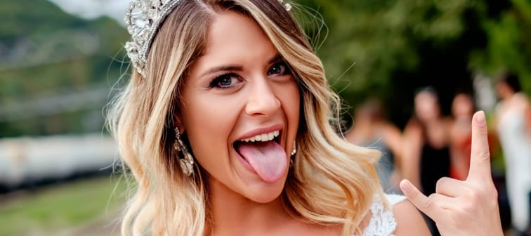 A bride throws up the horns