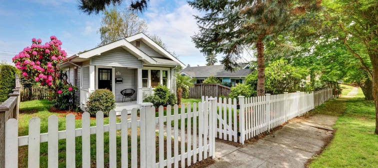 Cute craftsman home exterior with picket fence. Northwest, USA