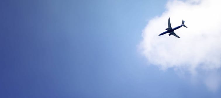 plane crossing a cloud vignette