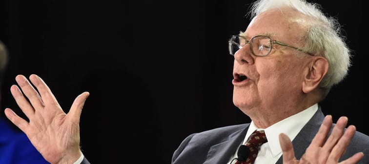 Warren Buffett speaks on stage