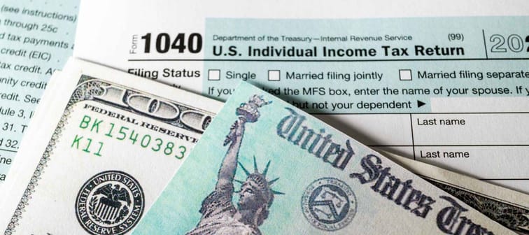 Stimulus economic tax return check and and 1040 Form.
