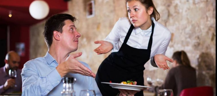 Unhappy restaurant customer complains to a server