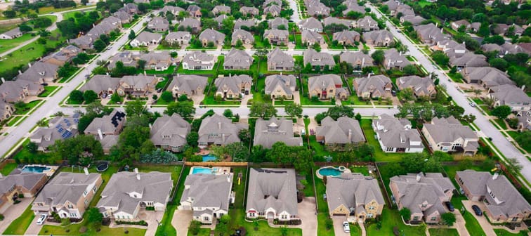 Endless rows of houses Aerial drone views above Suburbia Neighborhood outside of Round Rock , Texas , USA luxury houses and suburban homes in north Austin Suburb