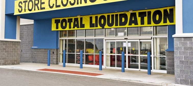 Angled Shot Of Retail Store Closing Sale/ Total Liquidation