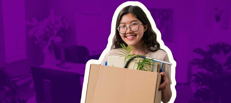 Beautiful girl with Korean Asian beauty gets a promotion in the office, changes position, carries her things packed in a box, moves them, leave job, she is happy smiling, leaves the company