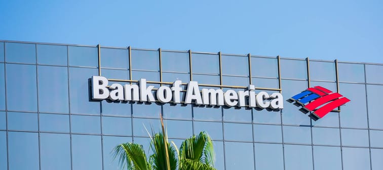 Bank of America sign and trademark logo on glass facade of BofA Financial Center tower