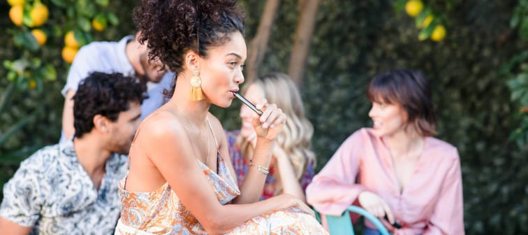Lifestyle smoking vape pool party gathering in Los Angeles