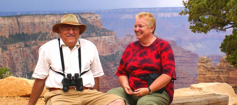 Baby boomers couple having fun in Grand Canyon.