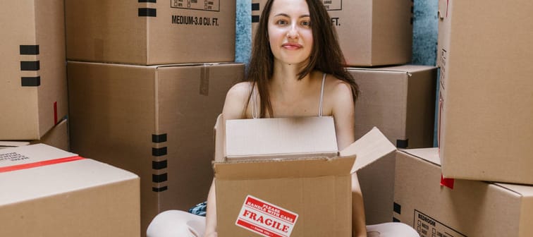 Woman moving into new house
