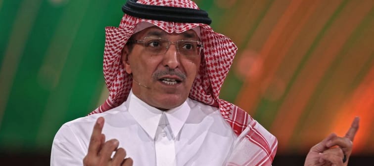 Saudi Minister of Finance Mohammed al-Jadaan speaks during a panel at a conference.
