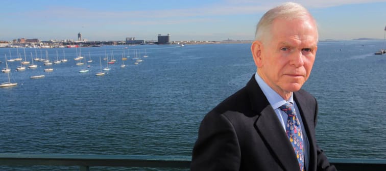 Renowned investment manager Jeremy Grantham poses on a balcony at his Rowes Wharf office in Boston