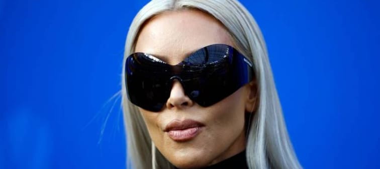 Kim Kardashian wearing large sunglasses, seen up close.