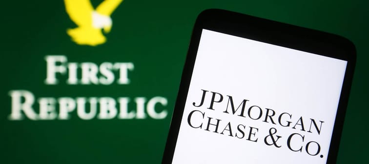 JPMorgan Chase & Co. logo is seen on a smartphone and First Republic Bank on a pc screen.
