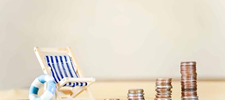 Miniature Beach Chair with Increasing Stacks of Coins